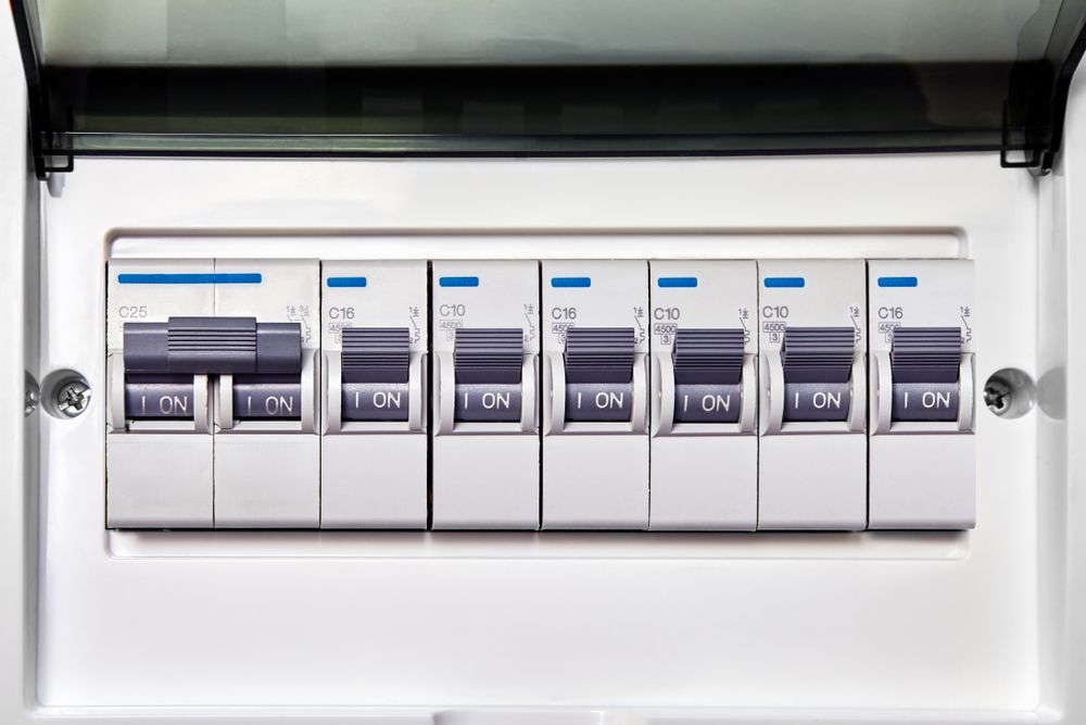 White Electrical Breaker Box With Six Switches — JMJ Plumbing and Electrical NSW In Tumbi Umbi, NSW