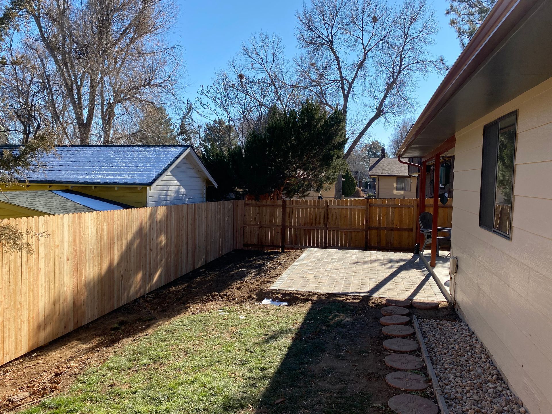 square paver patio fence lighting