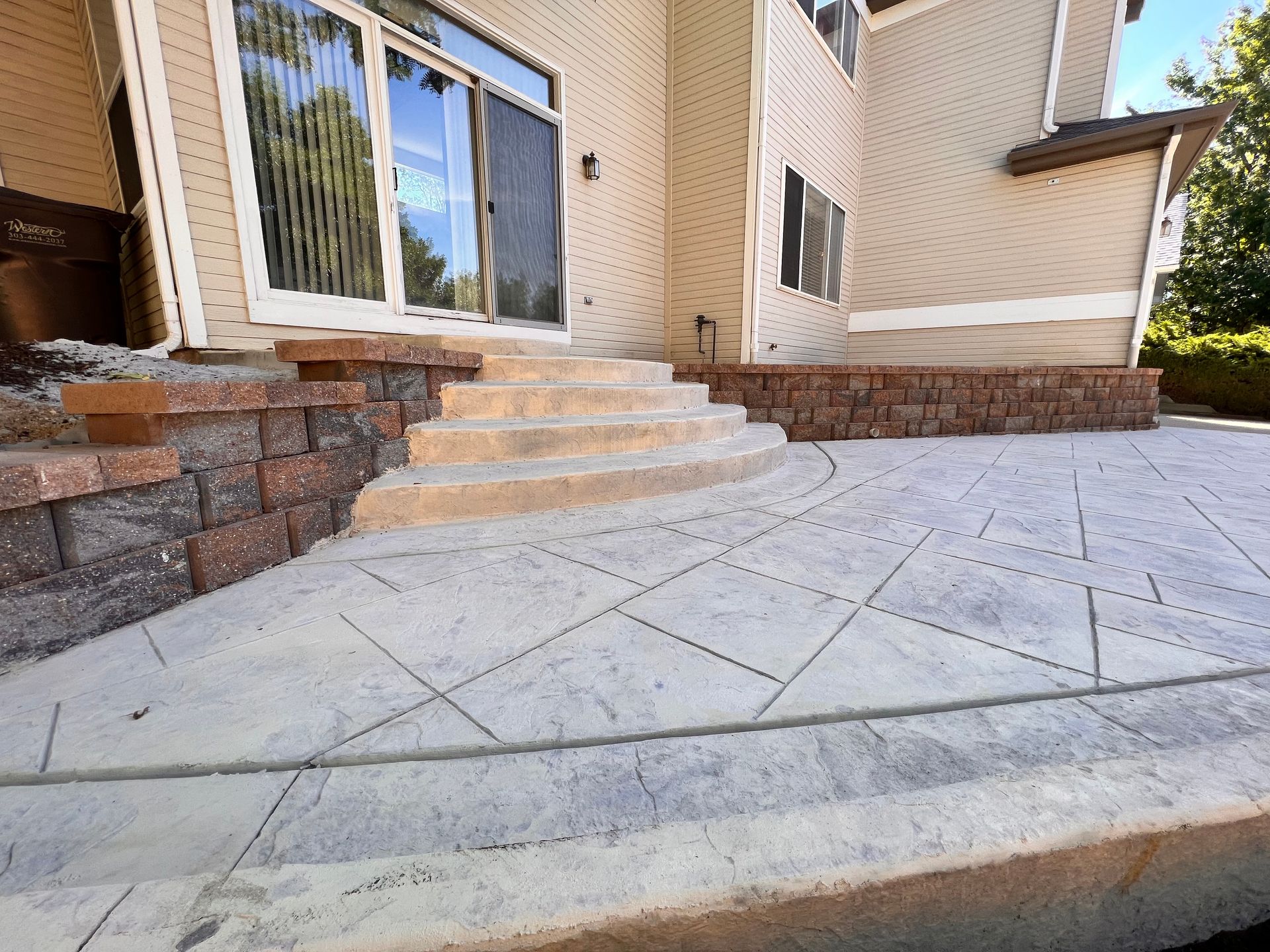 stamped concrete patio retaining wall