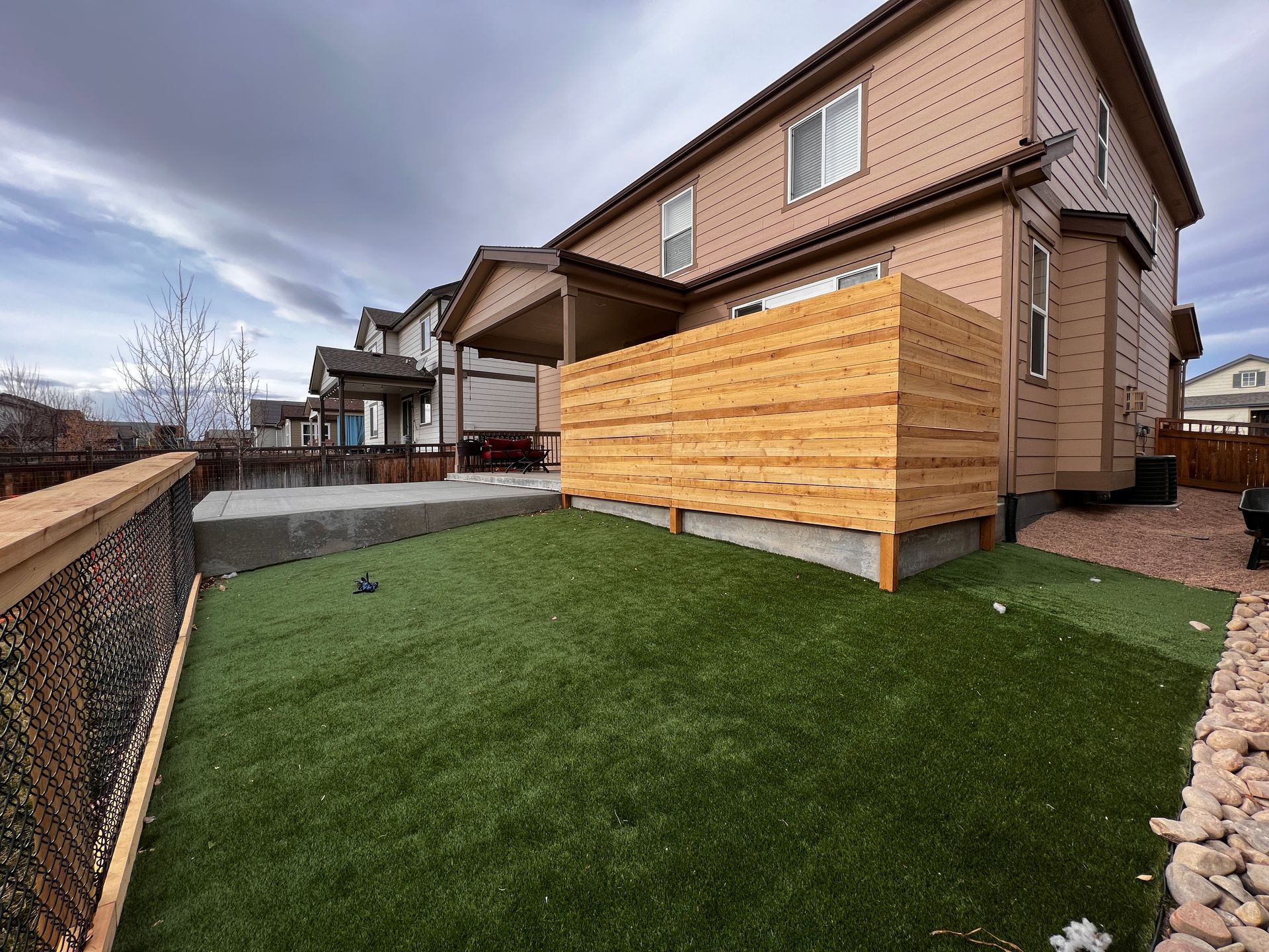 privacy fence concrete artificial turf