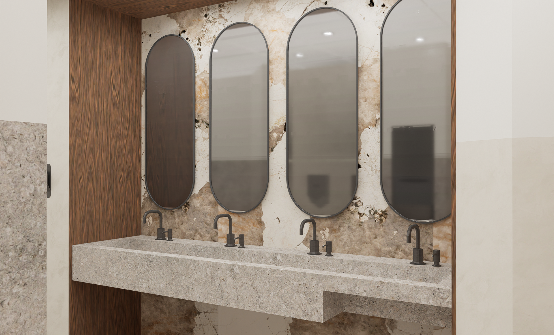 Salle de bains avec lavabos en pierre, miroirs ovales et mur en béton apparent.