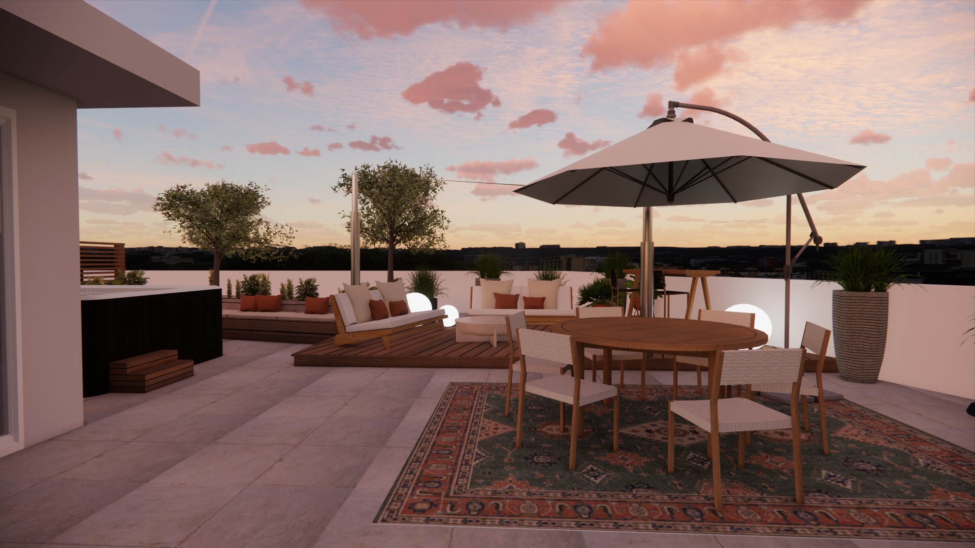 Terrasse sur le toit avec table, chaises, canapé, parasol et oliviers sous un ciel de coucher de soleil.