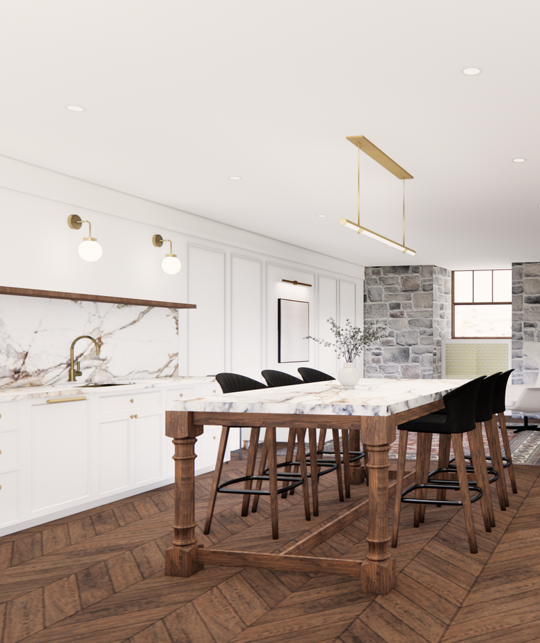 Cuisine avec comptoirs en marbre, table en bois avec tabourets noirs, armoires blanches et parquet à chevrons.