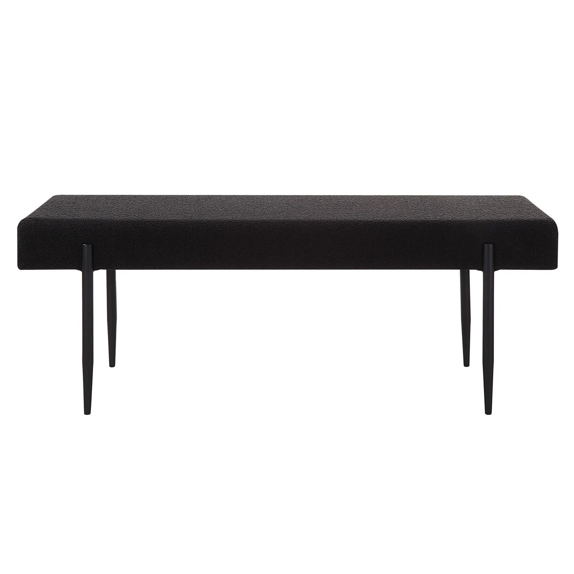 Banc noir texturé avec de fins pieds en métal noir.