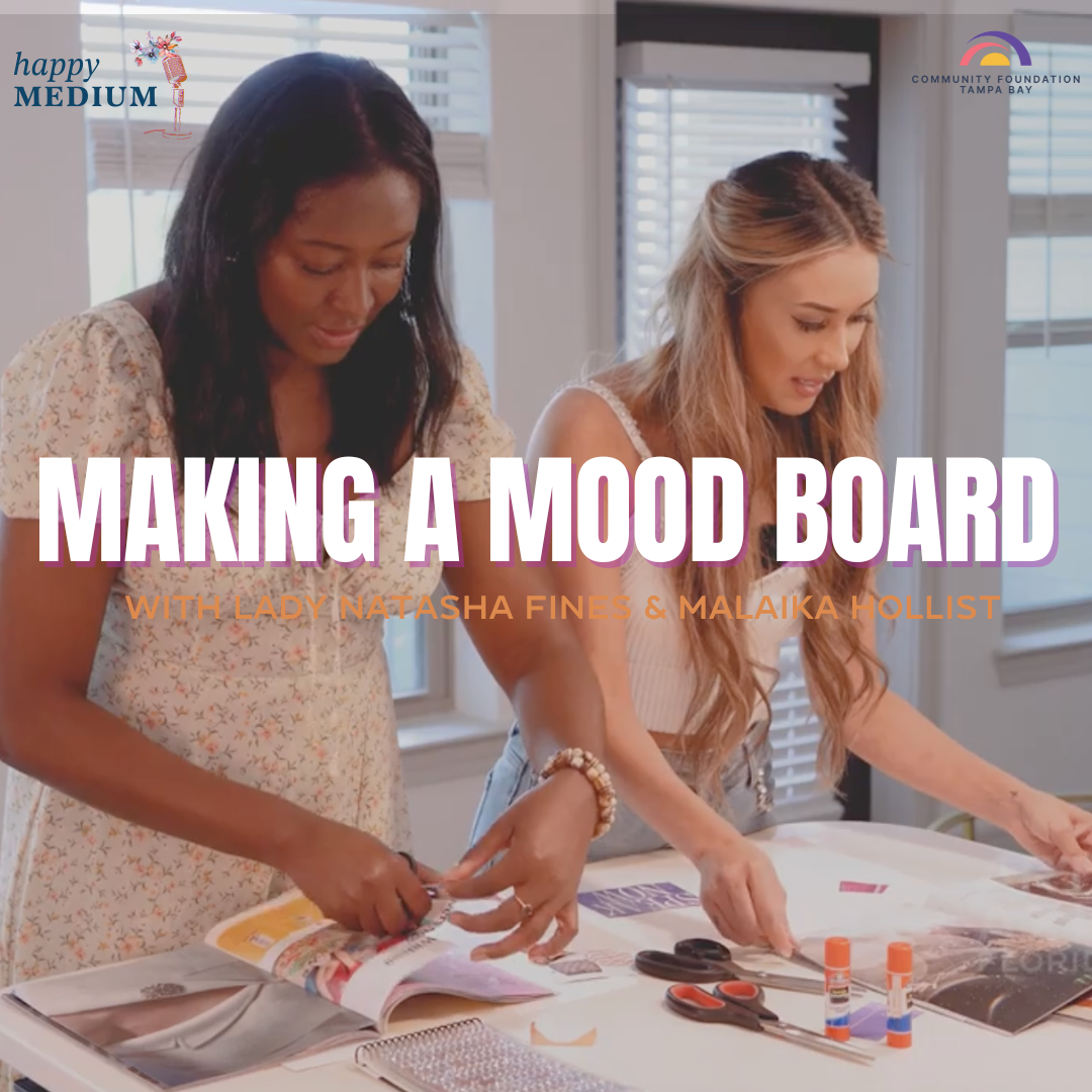 Two women making a mood board together. One is Black, the other white. Indoors, light setting.