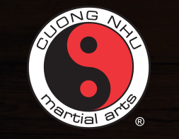 Cuong Nhu Martial Arts logo: yin-yang symbol (black & red) in a white circle; text