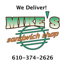 Mike’s Sandwich Shop logo with “We Deliver!” and phone number 610-374-2626