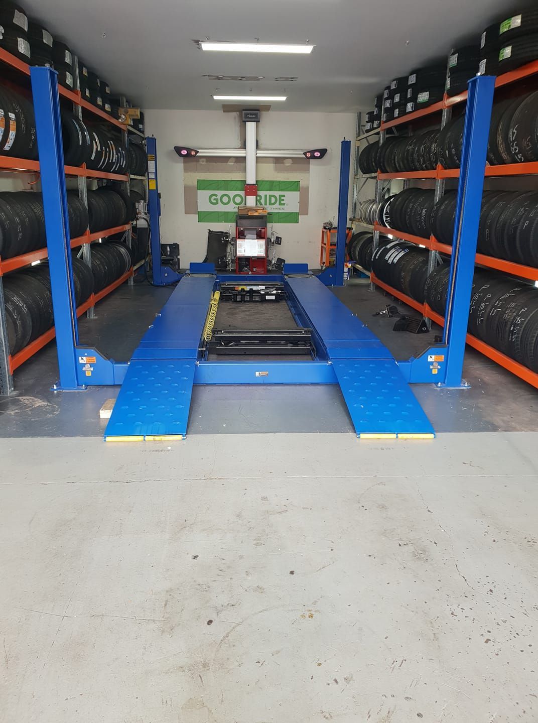 A warehouse filled with lots of tires and a sign that says dunlop — Budget Tyre Shed In Charmhaven, NSW