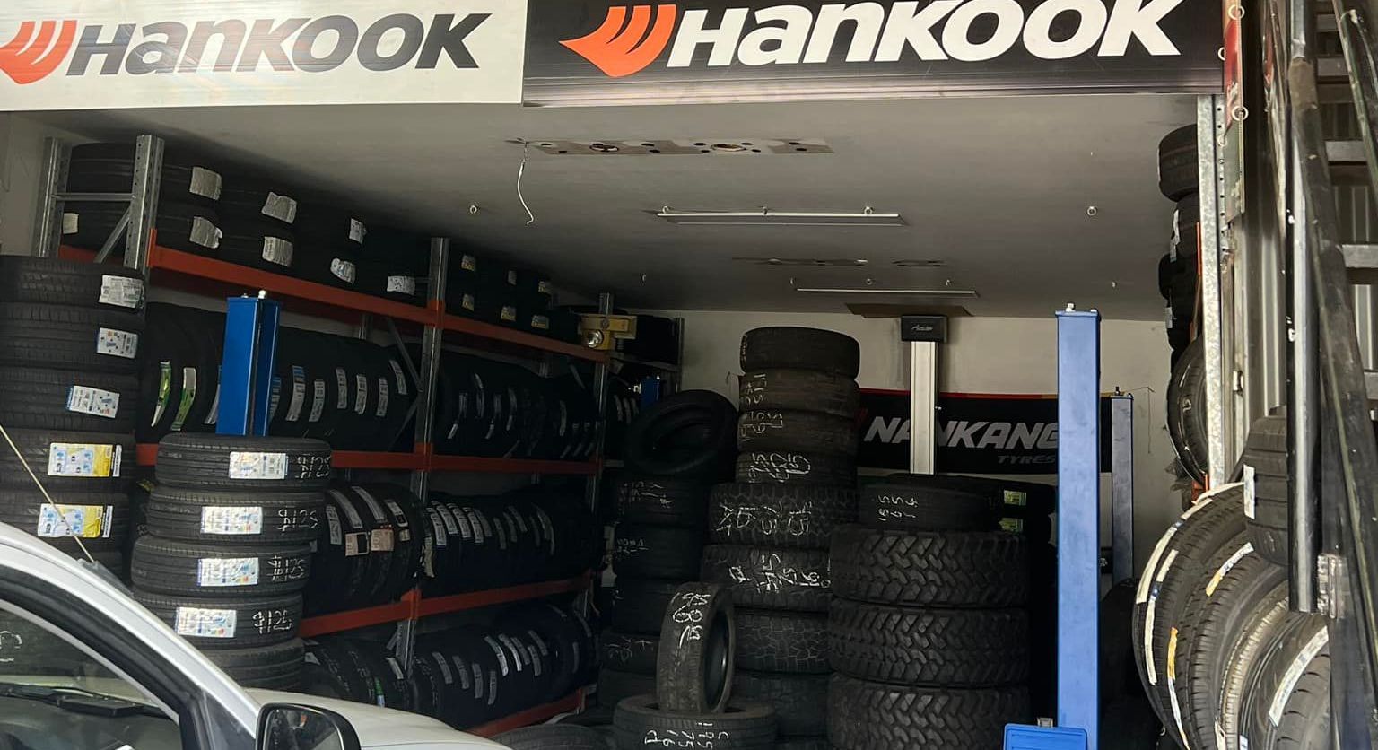 Wide selection of tyres displayed in the garage at Budget Tyre Shed Charmhaven, offering quality tyres for Central Coast drivers