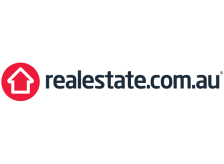 Realestate.com.au logo: red circle with a white house icon, text 