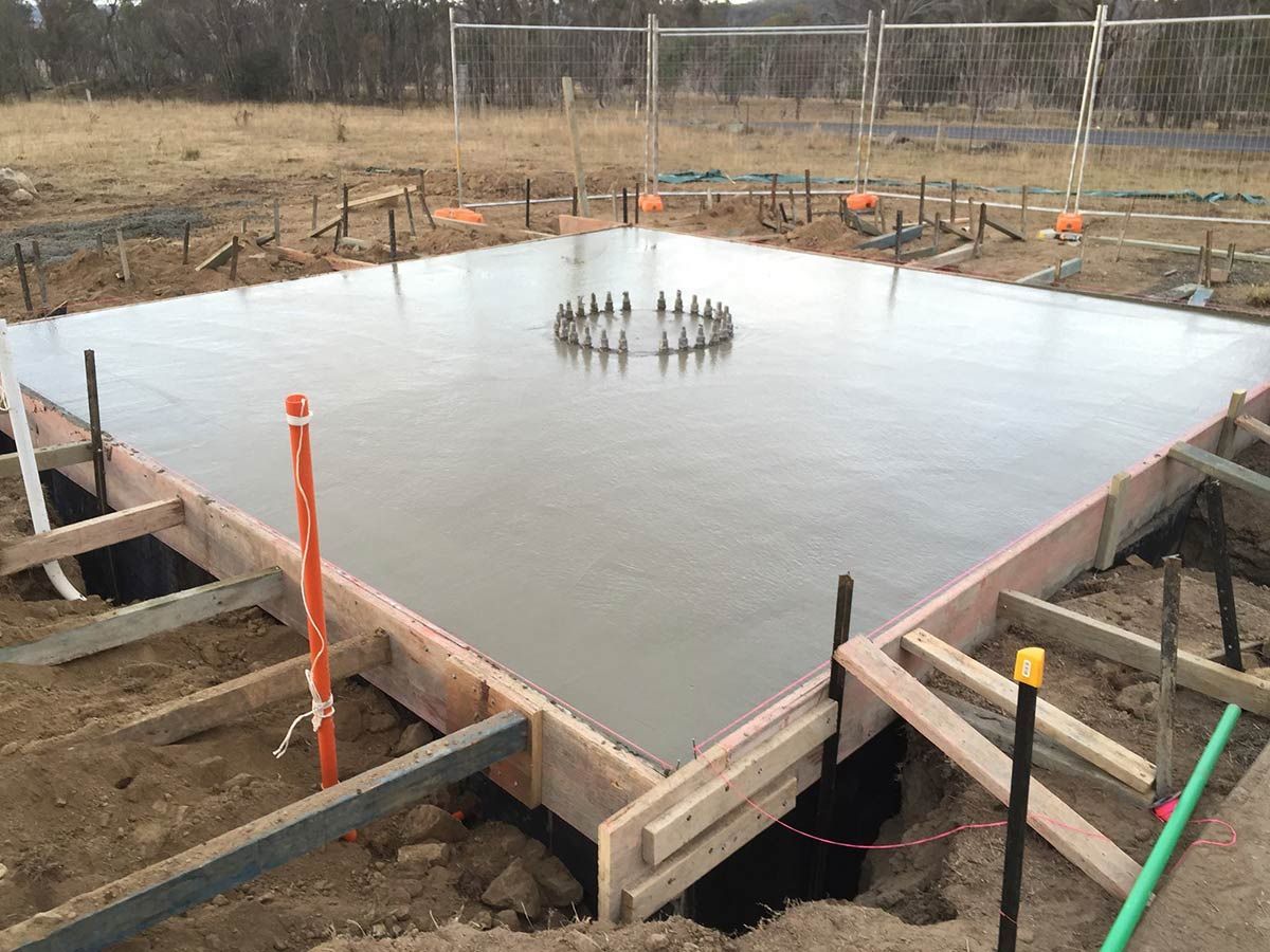 A Large Concrete Slab is Being Built in a Field — Heritage Concrete In Uralla, NSW