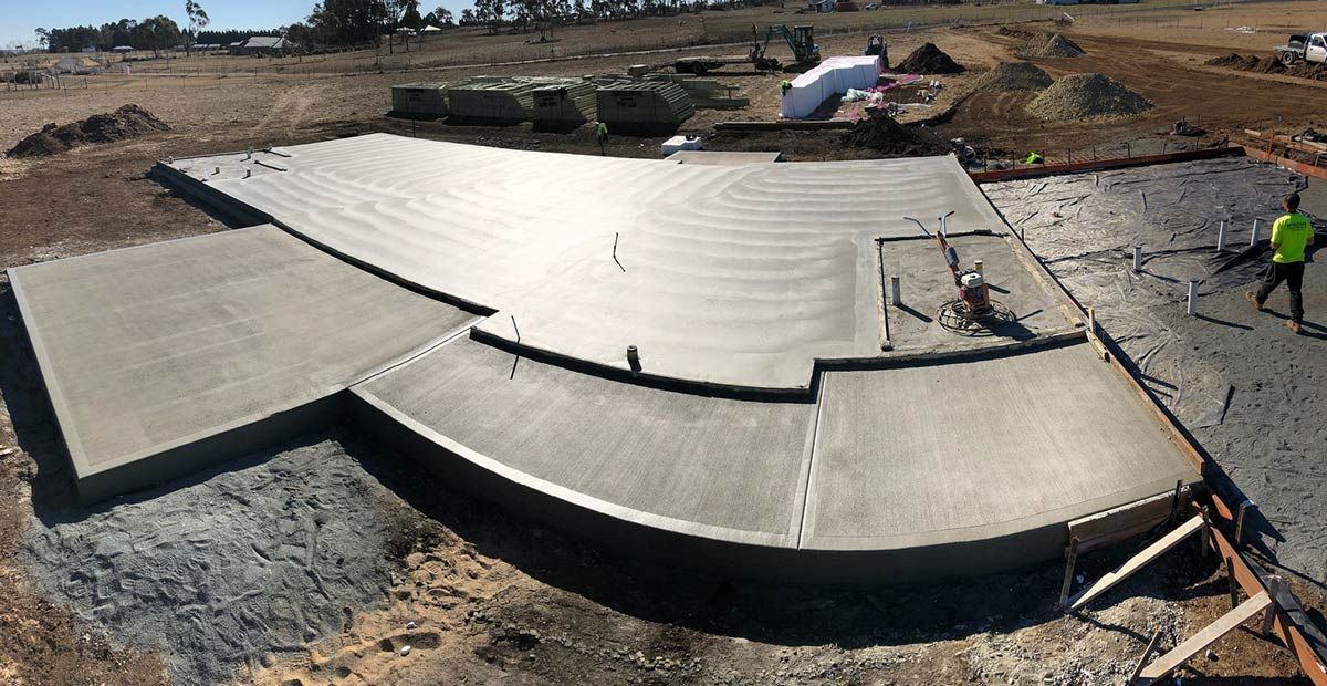 A Large Concrete Structure is Being Built in a Field — Heritage Concrete In Uralla, NSW
