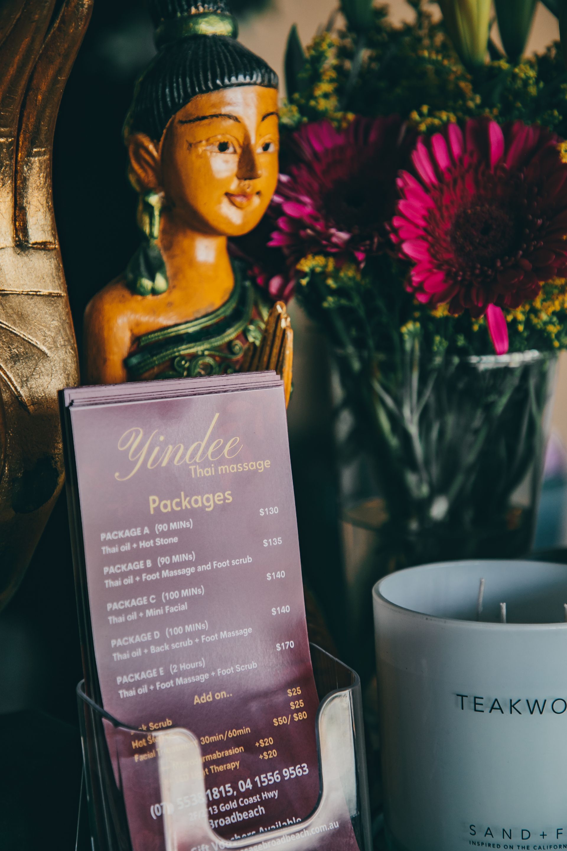 Wooden statue and menu for