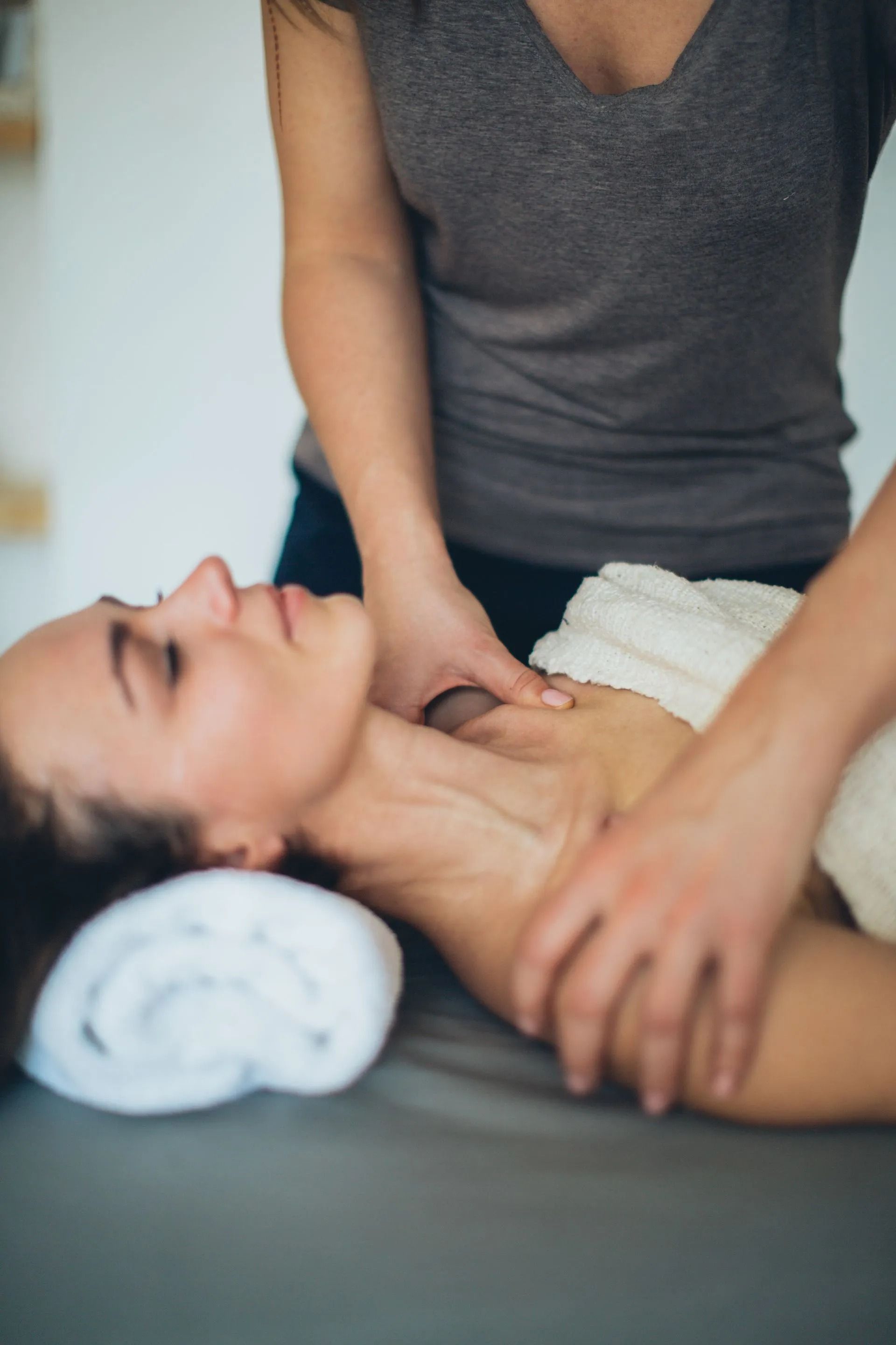 Person Having a Massage on a Massage Table — Traditional Massage Services In Broadbeach, QLD
