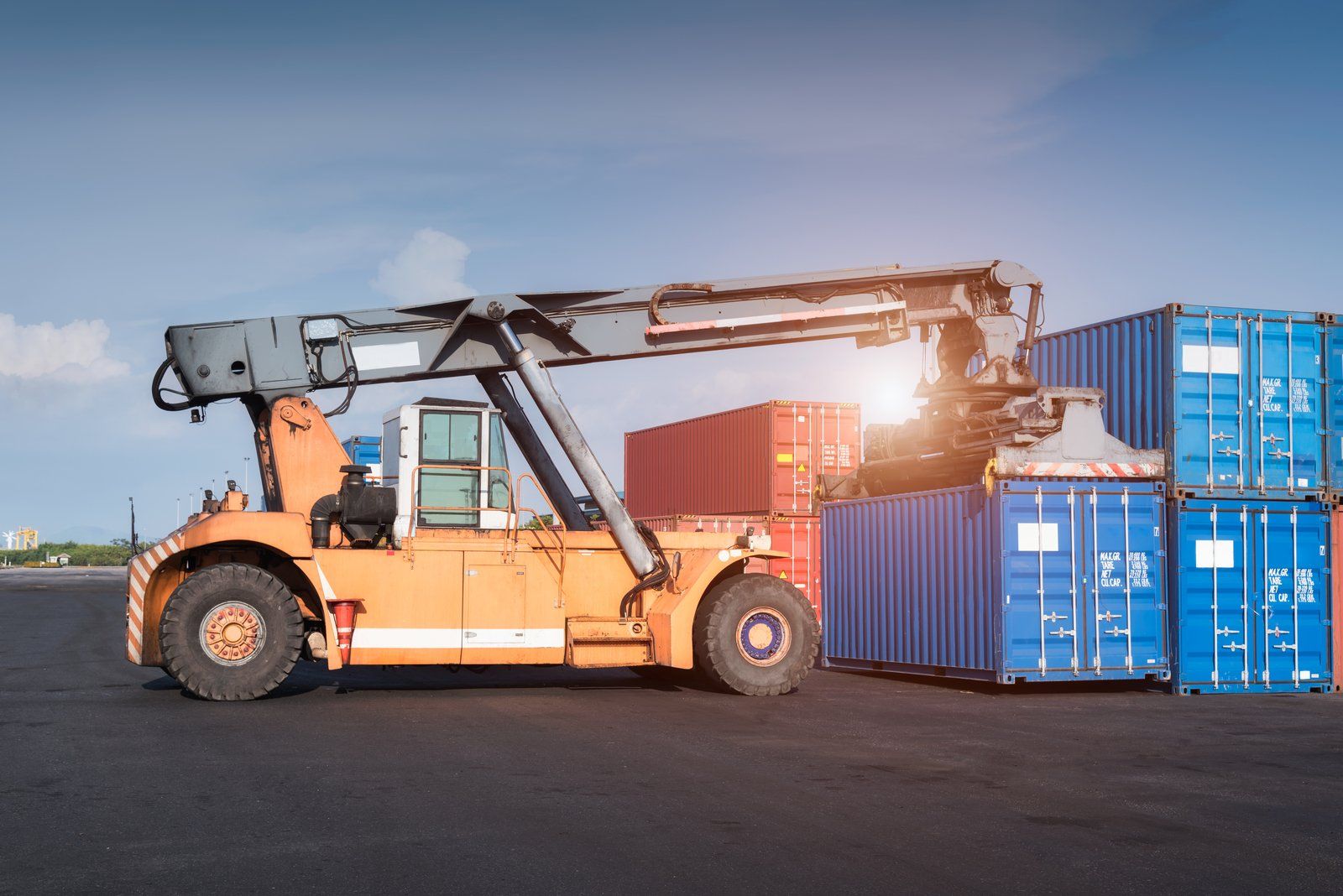 steel cargo containers beside the truck