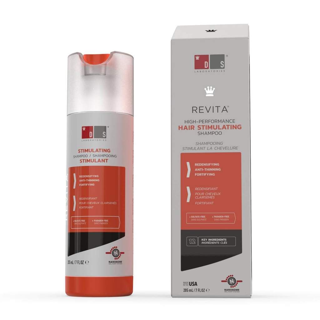 A bottle and box of revita hair stimulating shampoo