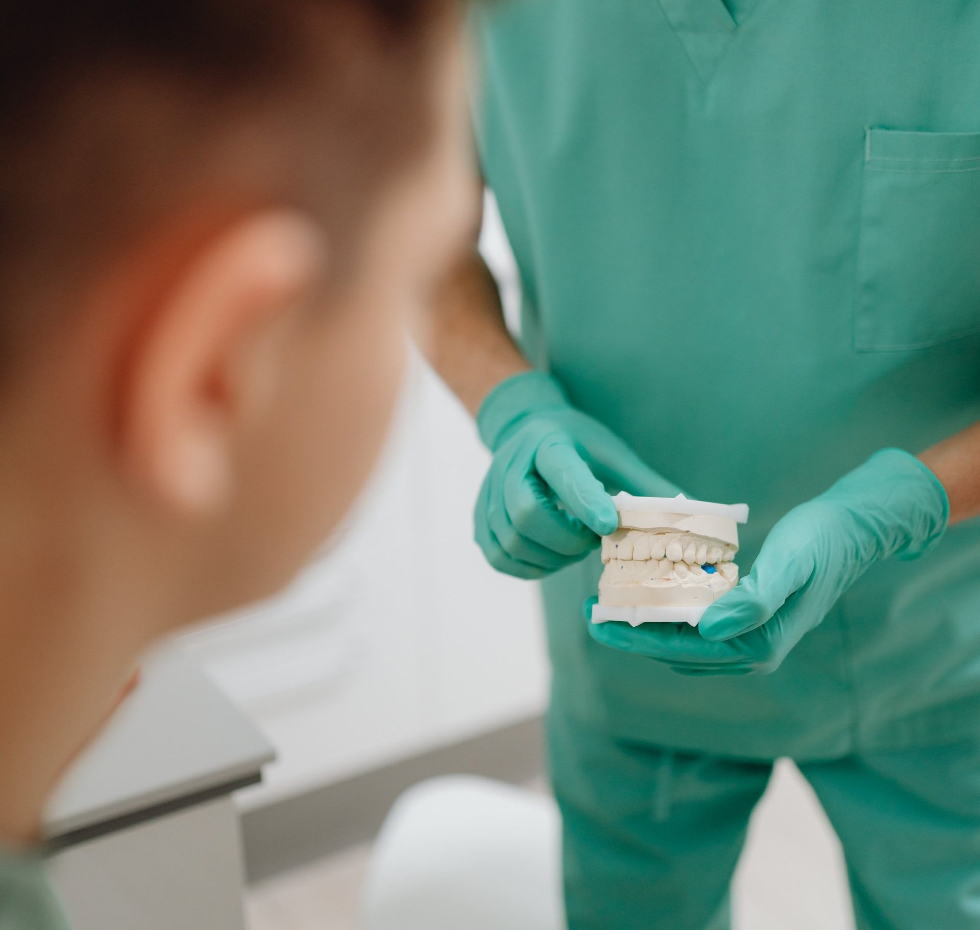 Dentist and patient discussing dental implant options