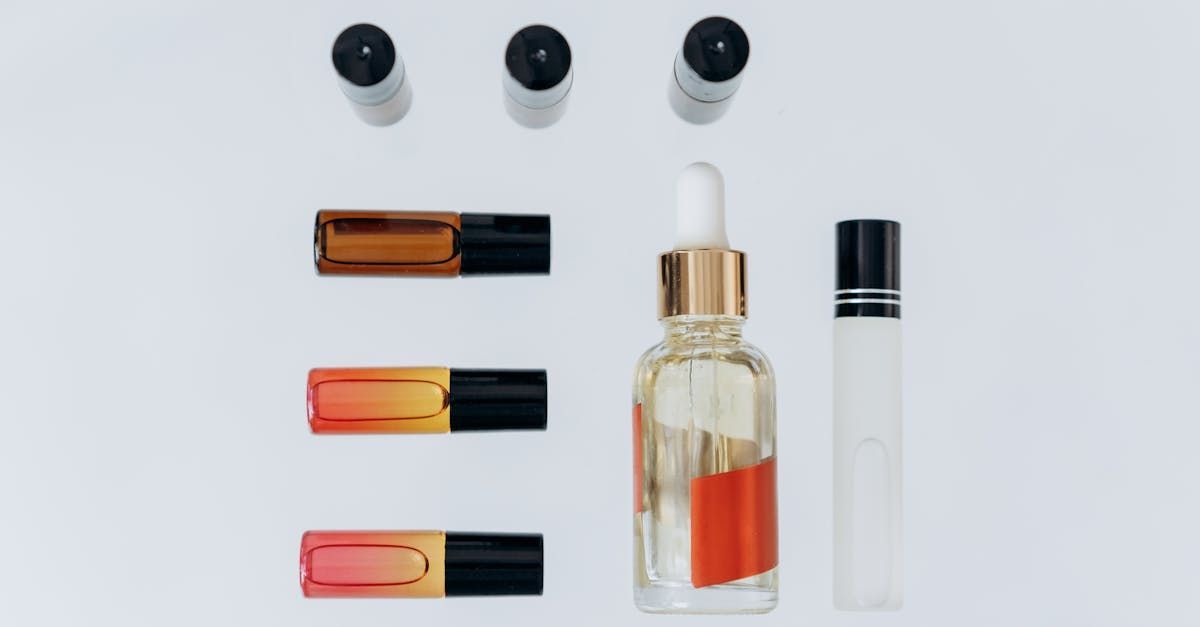 There are many different types of bottles and containers on the table.