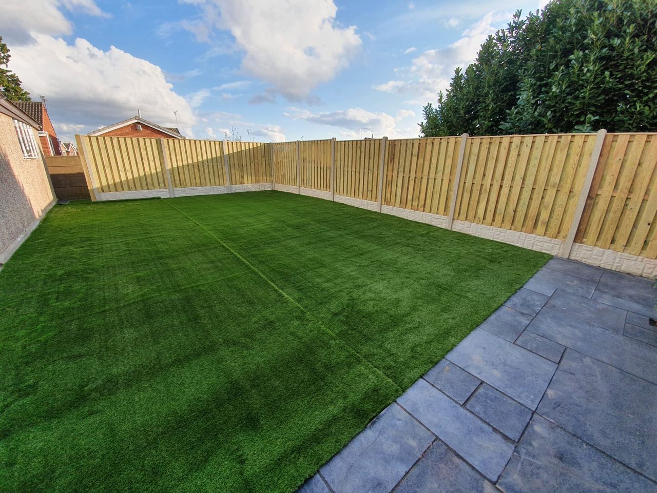 Artificial lawn and fencing fitted in a garden in Handsworth, Sheffield