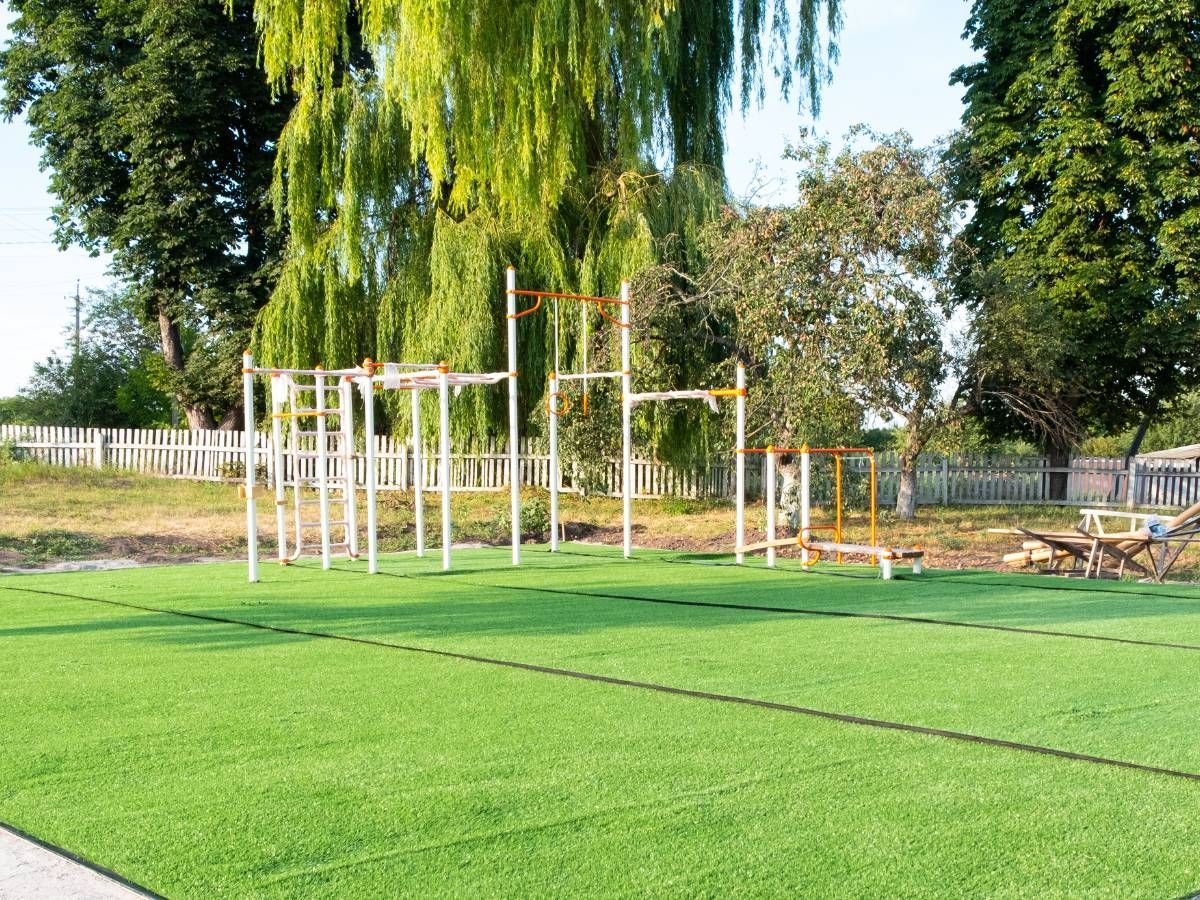 Artificial Grass Sheffield astro turf fitted for play area with climbing frames