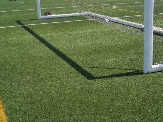 lady laying on the fake grass in Sheffield