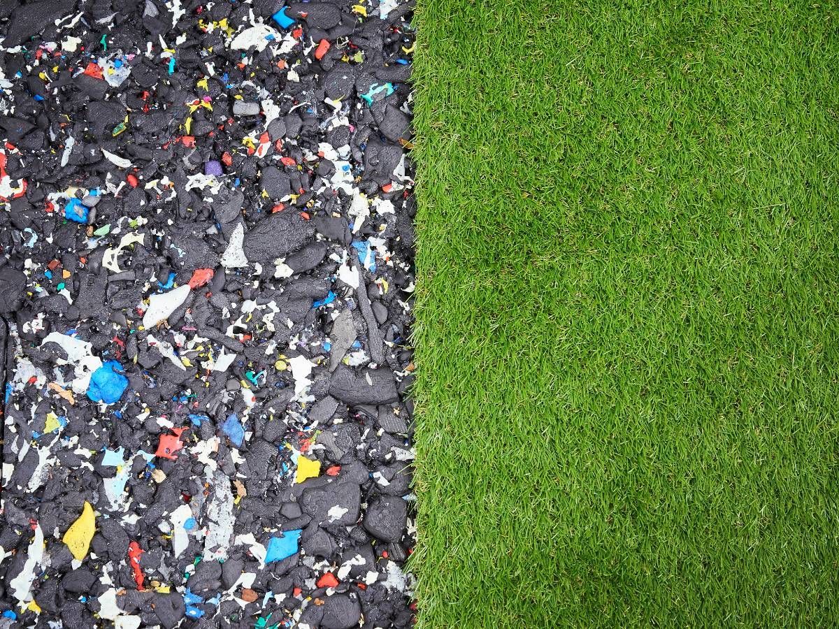 Artificial Grass Sheffield showing the shock absorbing pads which are fitted under artificial grass for play area