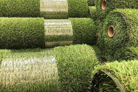 Rolls of different artificial grass types side by side
