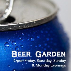 A blue beer can covered in condensation, with text reading 'BEER GARDEN' and the open days of Friday through Monday.