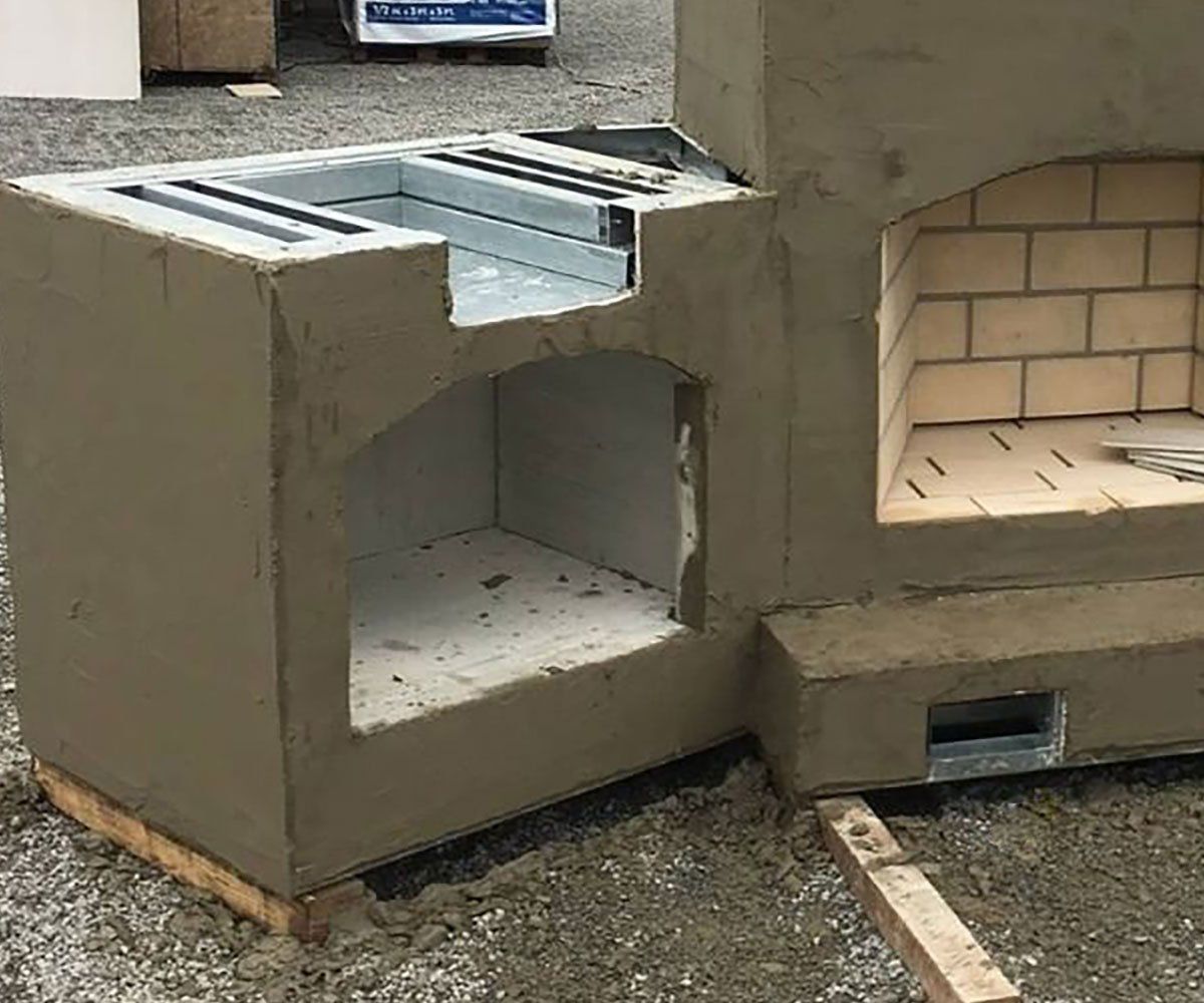 sturdy steel construction on Ohio backyard outdoor fireplace with wood boxes