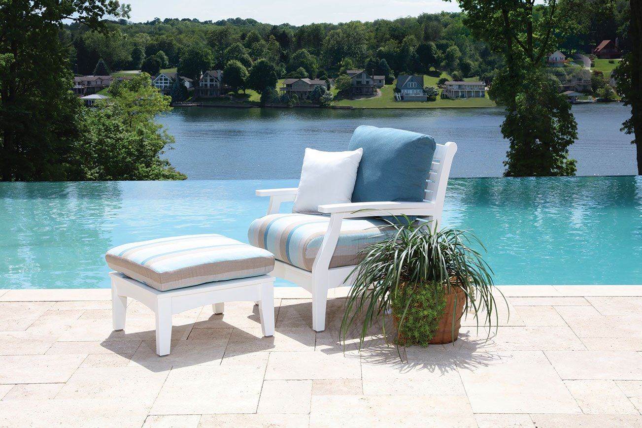 Deep seated outdoor chair next to Ohio pool made from amish weather resistant poly lumber