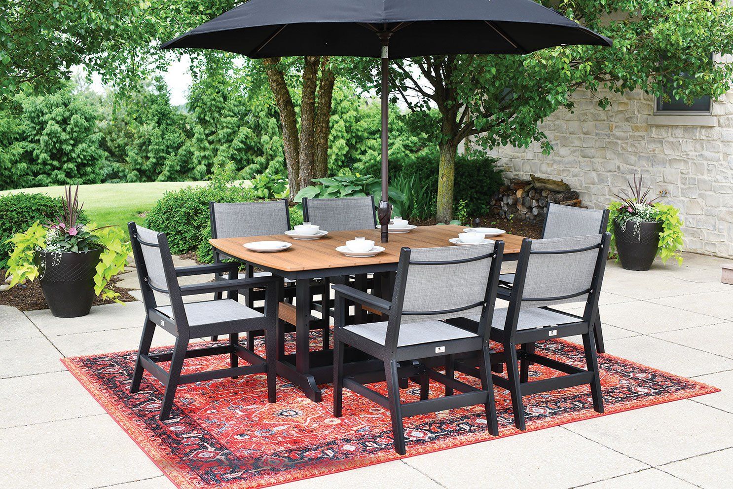 Outdoor patio dining on amish weather resistant poly furniture rectangular table in Ohio backyard outdoor living by Berlin Gardens