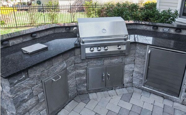 Outdoor kitchen with natural stone granite countertops in steel gray in Geneva Ohio