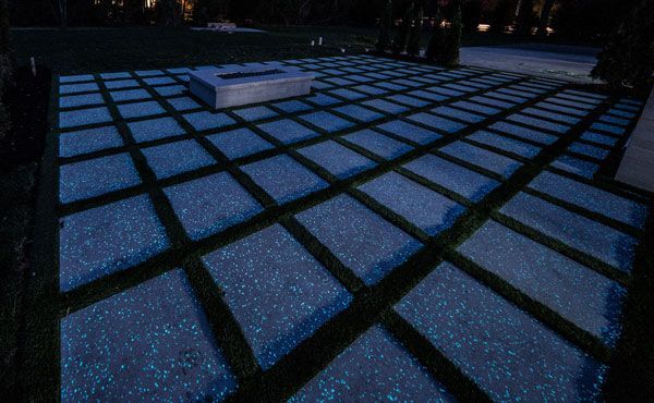 Firefly glow in the dark solar powered paving stones and bricks with fire pit in Lyndhurst Ohio backyard patio