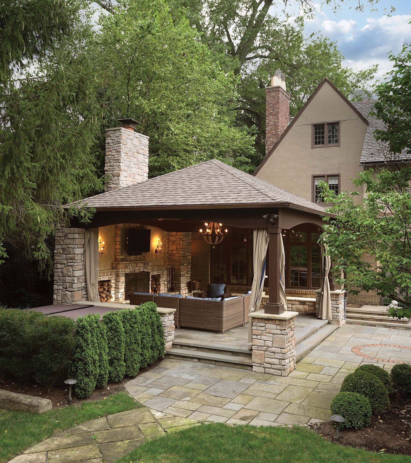 Berlin Gardens Outdoor Structure Patio with custom amish pavilion with fireplace and stone posts