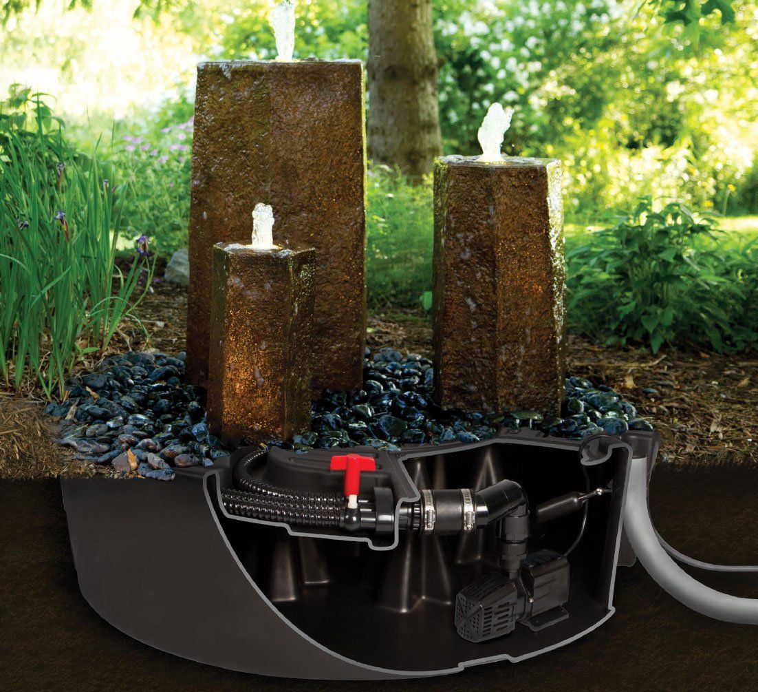 Stone bubbler water fountain system Ohio backyard with stone bubbling water fountain