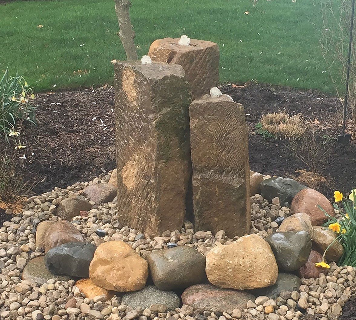 Natural Barn Stone Bubbler Water Fountain in Aurora Ohio backyard
