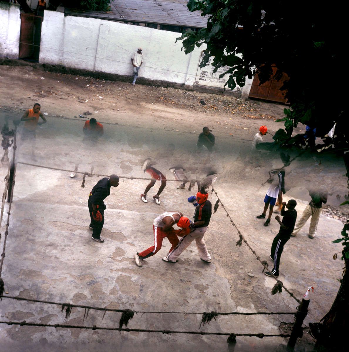 Congolese boxers training in a makeshift ring deep within Kinshasa's labyrinthine backstreets.