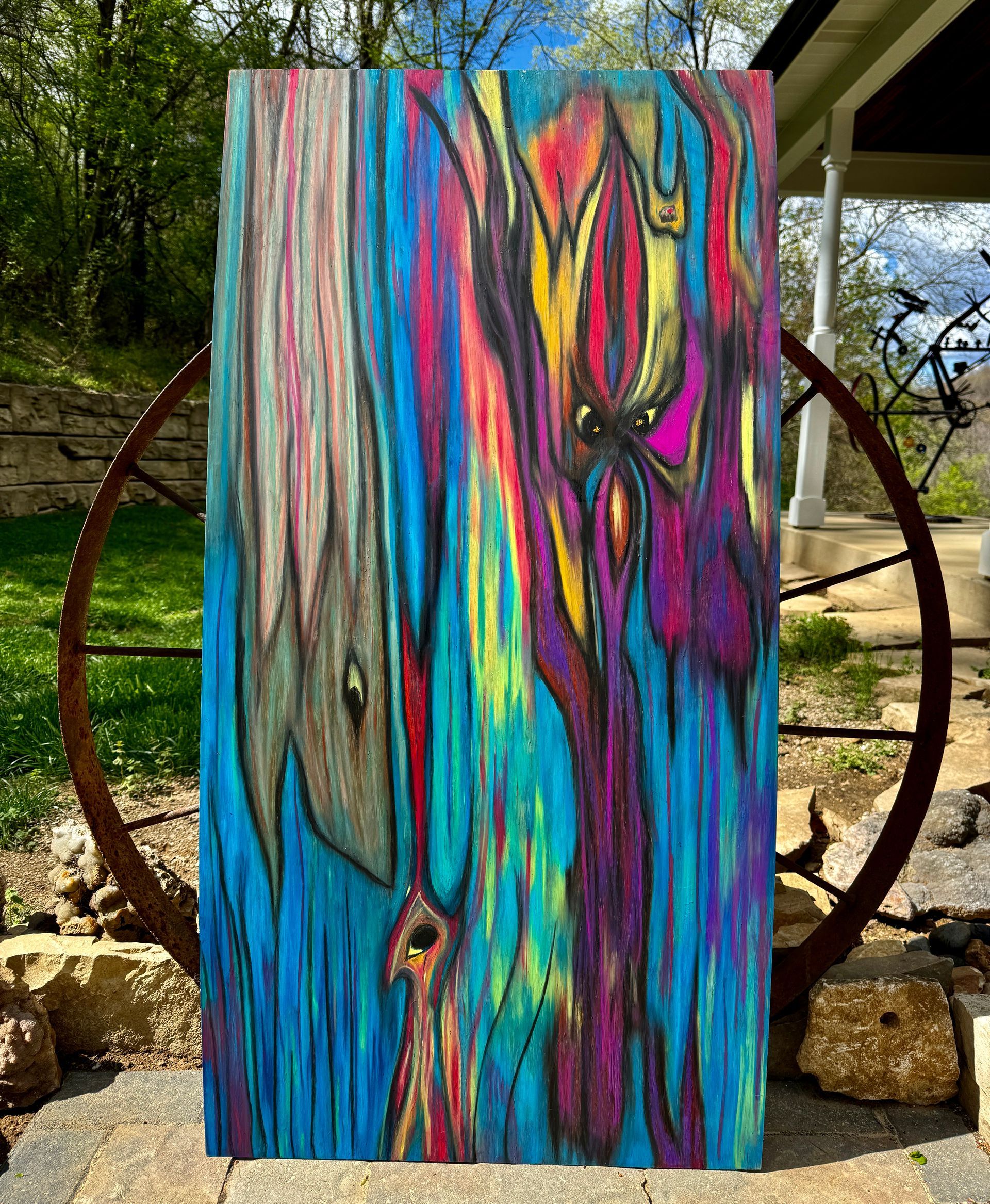 Monique Stauder's metamorphic art painting, Wildwood Creatures, using oil pastels on wood.