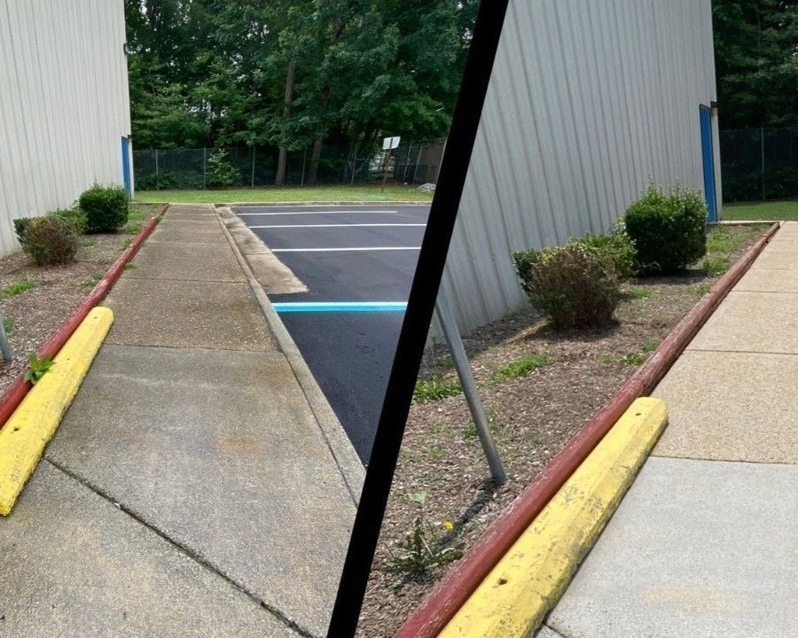 Split view of a curb ramp with yellow-painted edge beside a parking lot and building wall