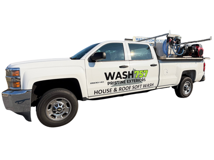 White service pickup truck with ladders and equipment, labeled “WASH” for house and roof cleaning.
