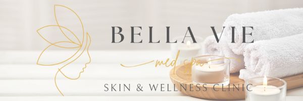 Bella Vie Skin & Wellness Clinic logo on a soft beige background with gold accents