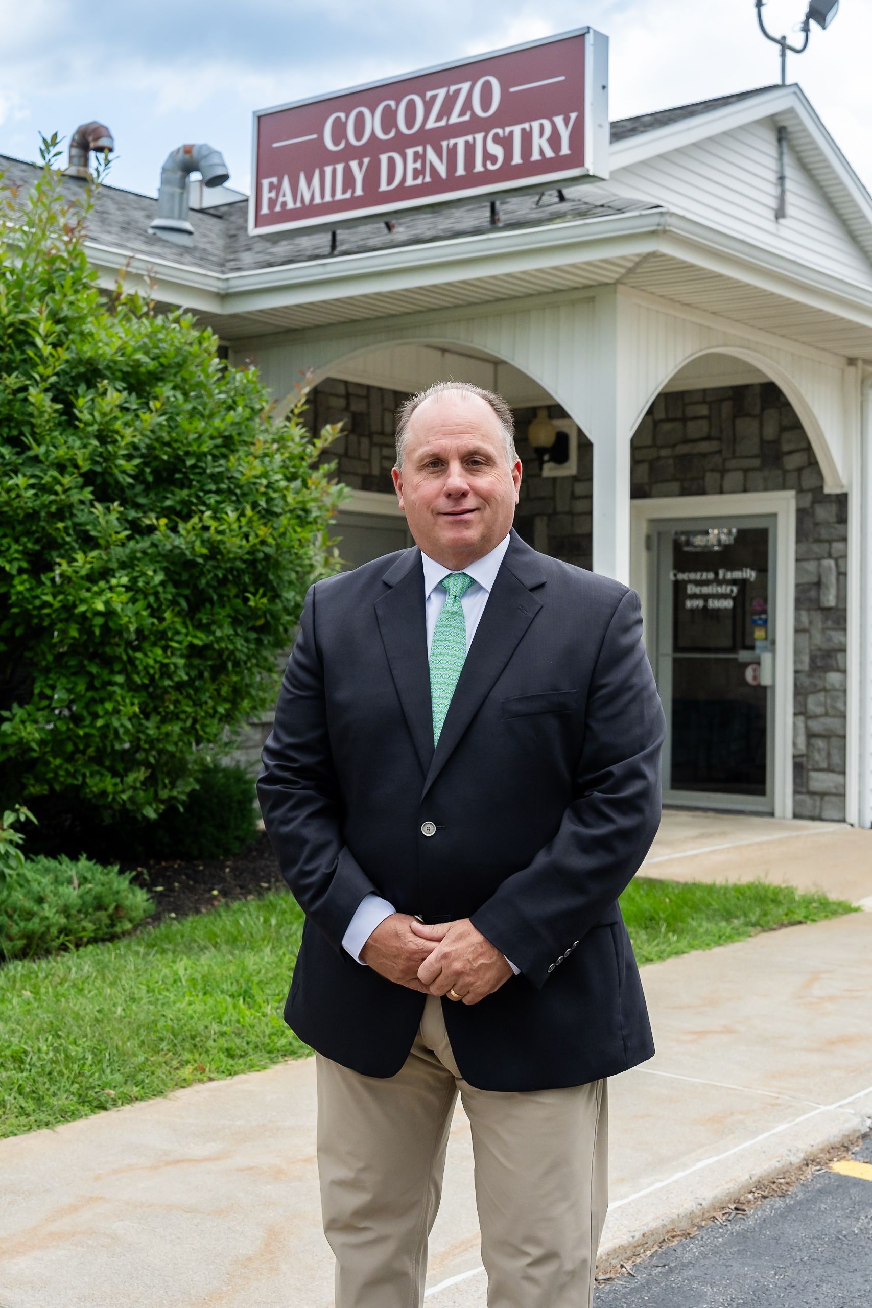 Dr. Mark Polsinello outside Cocozzo Family Dentistry in Malta, NY