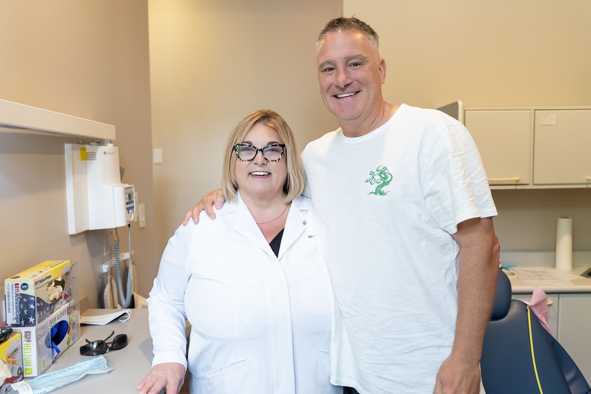 Dr. Christina Cocozzo with a smiling cosmetic dentistry patient at Cocozzo Family Dentistry in Malta, NY