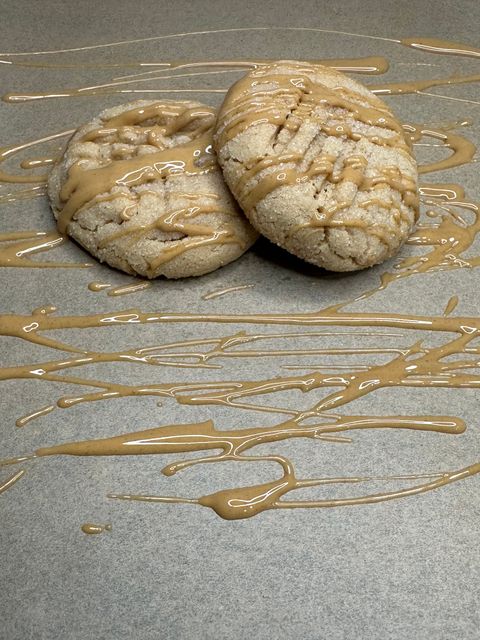 Peanut butter cookie drizzled with peanut butter sauce
