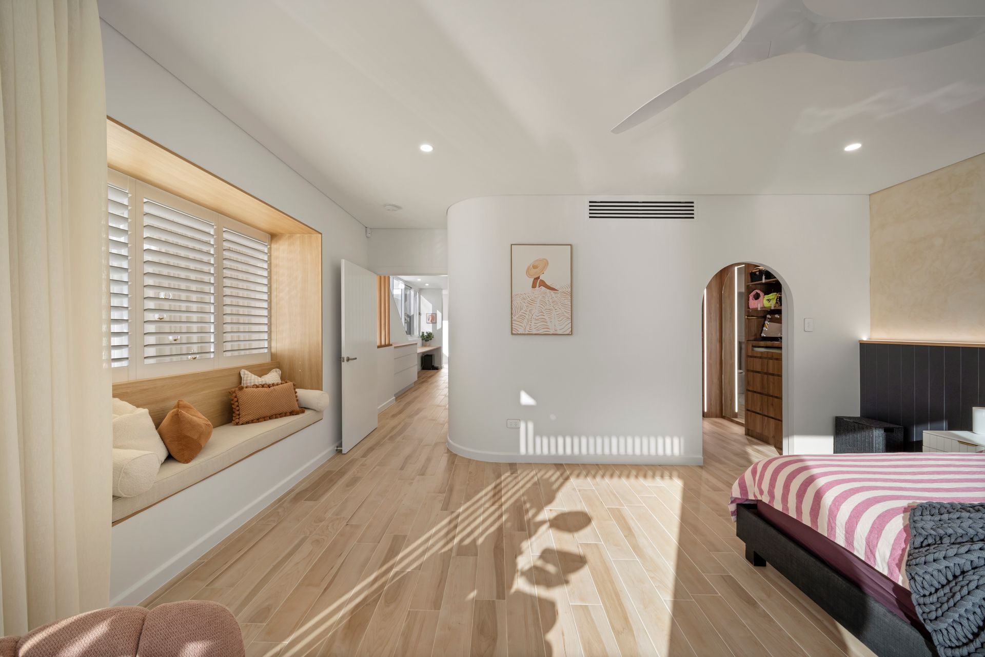 Bright Minimalist Bedroom With Window Seat — Simon Bell Constructions in Alice River, QLD