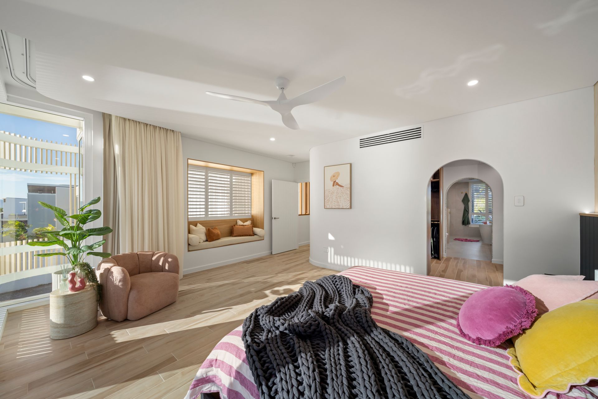 Bright Bedroom With a Bed — Simon Bell Constructions in Alice River, QLD