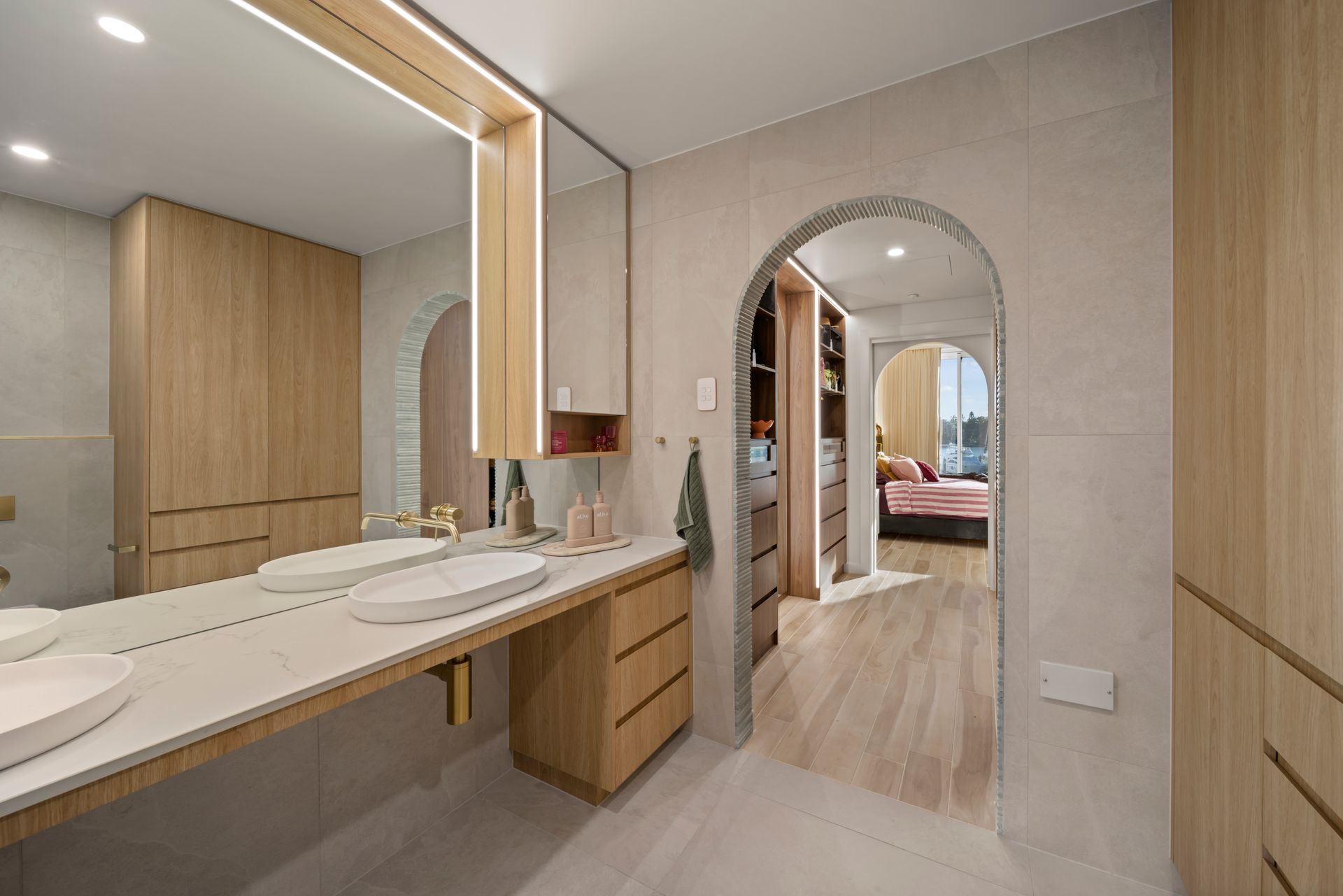 Modern Bathroom With Double Vanity, Arched Doorway — Simon Bell Constructions in Alice River, QLD