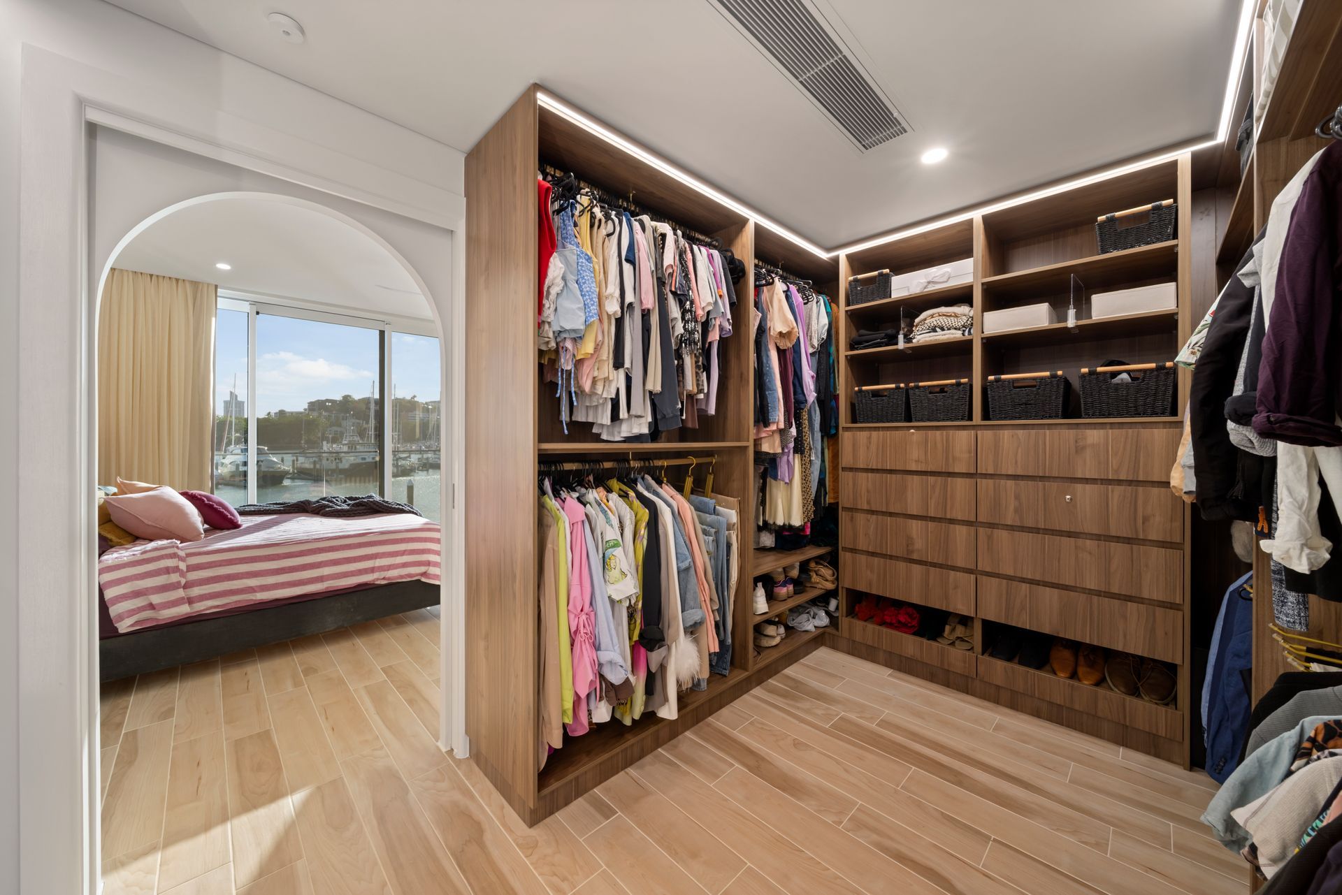 Walk-in Closet With Shelves, Hanging Clothes — Simon Bell Constructions in Alice River, QLD