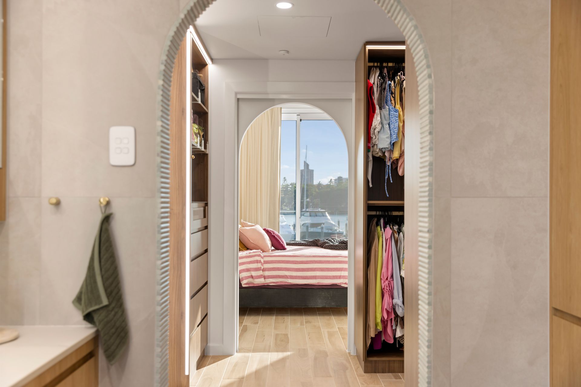 Modern Bedroom Hallway With Arched Opening, Bed — Simon Bell Constructions in Alice River, QLD