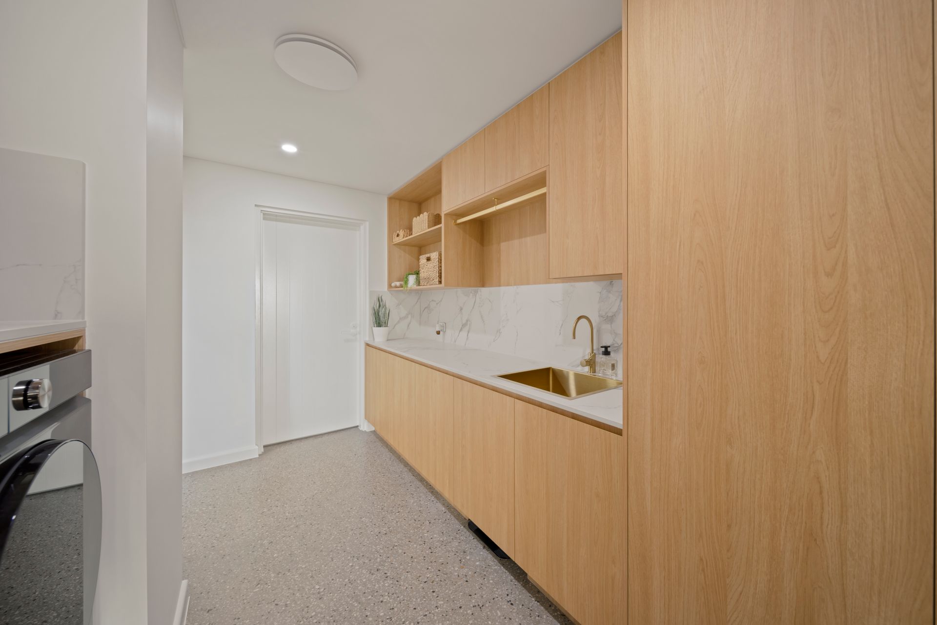 Modern Kitchen With Light Wood Cabinets, White Backsplash — Simon Bell Constructions in Alice River, QLD